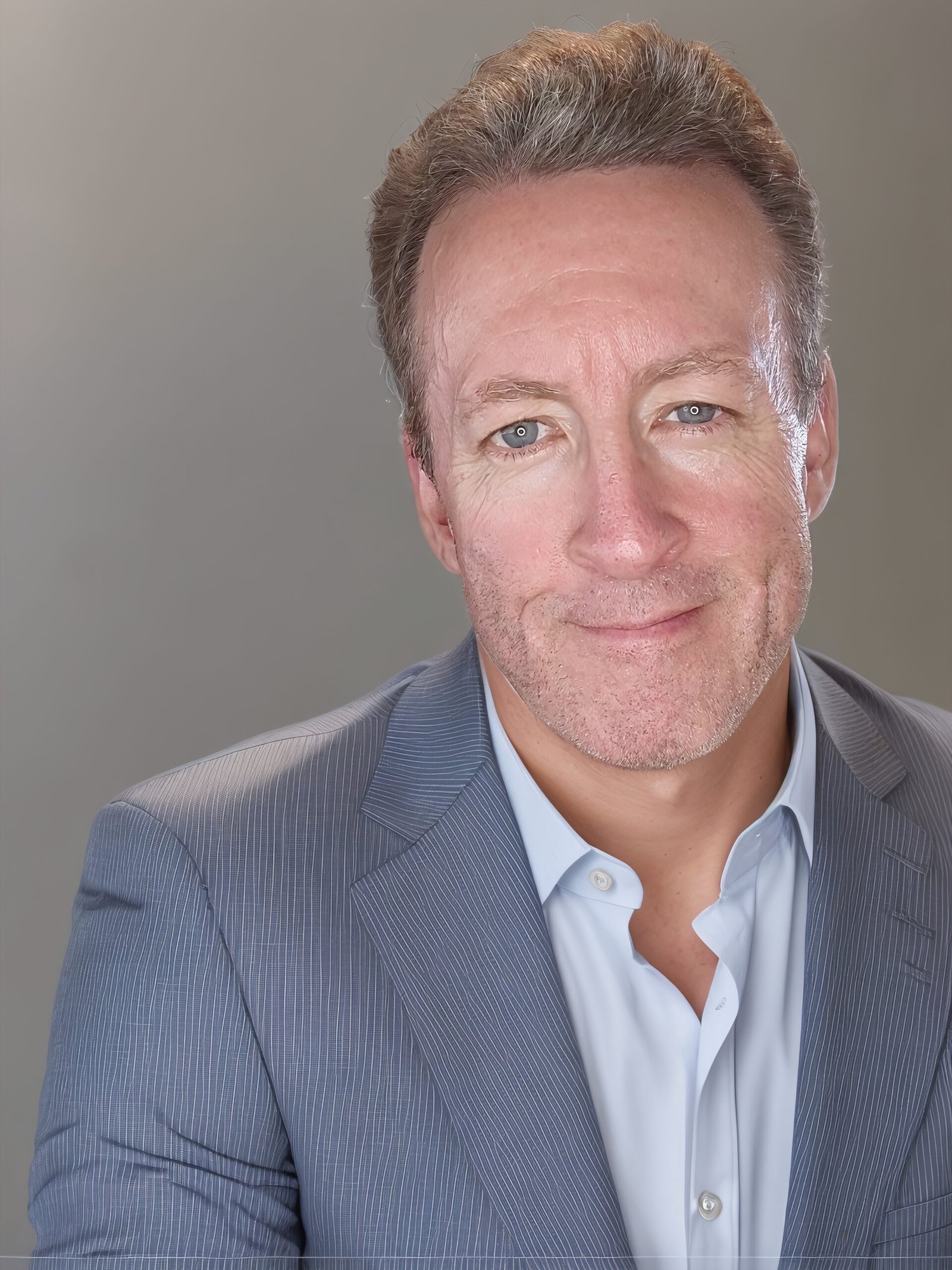 Picture of white male in grey suit